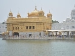 Devotees paying obeisance at Golden Temple in Amritsar. Devotees paying obeisance at Golden Temple in Amritsar.