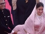 Neeraj Ghaywan holds up Janhvi Kapoor's outfit as she walks the Cannes Film Festival red carpet. Neeraj Ghaywan holds up Janhvi Kapoor's outfit as she walks the Cannes Film Festival red carpet.