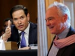 Marco Rubio stands by the Trump administration's controversial decision to offer refugee status to 59 white Afrikaners from South Africa, despite Senator Tim Kaine's inquiries about racial implications.