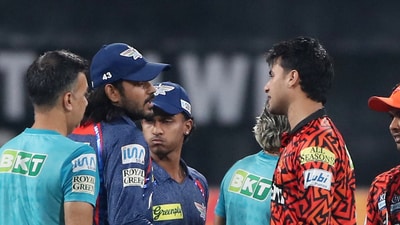Abhishek Sharma and Digvesh Rathi talk it out after their on-field altercation earlier in the day. (REUTERS)