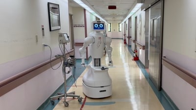 With Nvidia’s Jetson Orin edge computing platform and Holoscan sensor processing, Nurabot navigates hospital environments efficiently and safely. (Foxconn) With Nvidia’s Jetson Orin edge computing platform and Holoscan sensor processing, Nurabot navigates hospital environments efficiently and safely. (Foxconn)