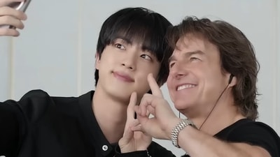 BTS' Jin takes a selfie with Hollywood star Tom Cruise. BTS' Jin takes a selfie with Hollywood star Tom Cruise.