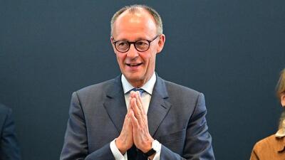 Leader of the conservative Christian Democratic Union CDU party and German Chancellor Friedrich Merz acknowledges applause on his first party board meeting as German Chancellor in Berlin on May 19. (AFP) Leader of the conservative Christian Democratic Union CDU party and German Chancellor Friedrich Merz acknowledges applause on his first party board meeting as German Chancellor in Berlin on May 19. (AFP)