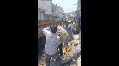 MC removing encroachments in Mayapuri, Ludhiana on Tuesday. (HT Photo)