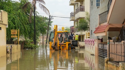 Waterlogged area after heavy rains, in Bengaluru. (PTI) Waterlogged area after heavy rains, in Bengaluru. (PTI)