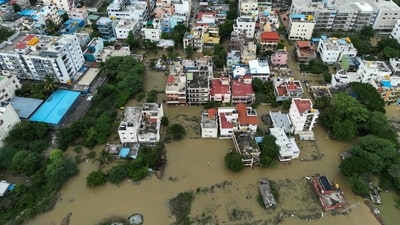 An aerial view shows a flooded locality following heavy rainfall in Bengaluru on May 19, 2025. (AFP)