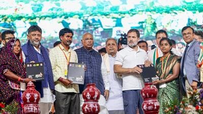 Lok Sabha LoP and Congress MP Rahul Gandhi presents home ownership rights to SC-ST-OBC families during the Samarpane Sankalpa Rally at Hosapete, in Vijayanagara on Tuesday. Party President Mallikarjun Kharge, Karnataka Chief Minister Siddaramaiah, State Deputy Chief Minister DK Shivakumar and others also present. Lok Sabha LoP and Congress MP Rahul Gandhi presents home ownership rights to SC-ST-OBC families during the Samarpane Sankalpa Rally at Hosapete, in Vijayanagara on Tuesday. Party President Mallikarjun Kharge, Karnataka Chief Minister Siddaramaiah, State Deputy Chief Minister DK Shivakumar and others also present.