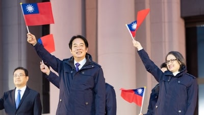 Taiwan's President Lai Ching-te and Vice President Hsiao Bi-khim taking part in a flag-raising ceremony at the Presidential office in Taipei, on the first day of the new year. (AFP) Taiwan's President Lai Ching-te and Vice President Hsiao Bi-khim taking part in a flag-raising ceremony at the Presidential office in Taipei, on the first day of the new year. (AFP)