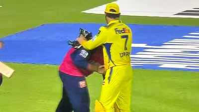 Vaibhav Suryavanshi touching MS Dhoni's feet Vaibhav Suryavanshi touching MS Dhoni's feet