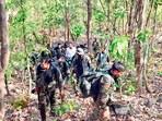 CRPF personnel conduct a search operation during an encounter with Naxalites at Lugu hills, in Bokaro.
CRPF personnel conduct a search operation during an encounter with Naxalites at Lugu hills, in Bokaro.
