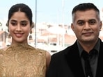 Janhvi Kapoor poses along with director and writer Neeraj Ghaywan during a photocall for Homebound at the 78th edition of the Cannes Film Festival. (Photo by Bertrand GUAY / AFP)