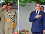 Pakistan's Prime Minister Shehbaz Sharif (R) and general Asim Munir review a passing out parade at the Pakistan Military Academy (PMA) Kakul, in Abbottabad. Pakistan's Prime Minister Shehbaz Sharif (R) and general Asim Munir review a passing out parade at the Pakistan Military Academy (PMA) Kakul, in Abbottabad.