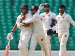 Vidarbha's batter Karun Nair is being congratulated Vidarbha's batter Karun Nair is being congratulated