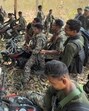This photograph taken on March 16, 2025, shows District Reserve Guard (DRG) personnel patrolling during a simulation exercise at their base in Dantewada, in Bastar division of Chhattisgarh This photograph taken on March 16, 2025, shows District Reserve Guard (DRG) personnel patrolling during a simulation exercise at their base in Dantewada, in Bastar division of Chhattisgarh