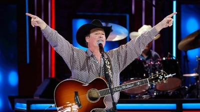 Clay Walker performed at the Pasadena Strawberry Festival in Texas. (Getty Images via AFP) Clay Walker performed at the Pasadena Strawberry Festival in Texas. (Getty Images via AFP)