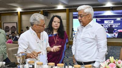 Commerce secretary Sunil Barthwal (right) interacts with participants at the International Tea Day celebrations at Vanijya Bhavan on Wednesday. (via PTI/PIB)