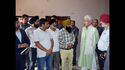 J&K LG Manoj Sinha meets kin of Pakistan shelling victims in Poonch on Wednesday. He also visited Gurdwara Dera Santpura Nangali Sahib, which was hit by a shell (ANI) J&K LG Manoj Sinha meets kin of Pakistan shelling victims in Poonch on Wednesday. He also visited Gurdwara Dera Santpura Nangali Sahib, which was hit by a shell (ANI)