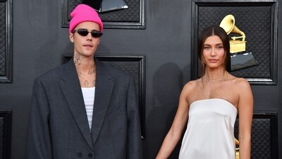 Hailey Bieber's Vogue cover marks her modeling success, but her husband Justin's Instagram post sparked controversy. Reports suggest their relationship is marked with 'love hard, fight hard' phenomenon.
(Photo by ANGELA WEISS / AFP) (AFP) Hailey Bieber's Vogue cover marks her modeling success, but her husband Justin's Instagram post sparked controversy. Reports suggest their relationship is marked with 'love hard, fight hard' phenomenon.
(Photo by ANGELA WEISS / AFP) (AFP)
