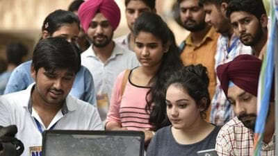 New Delhi, India - June 3, 2016: students summiting their Admission Form at Internet Cyber Cafe at Delhi University on May 4, 2015 in New Delhi, India. The open house sessions give students and parents holistic information about the university and answers students admission related queries in New Delhi, India, on Friday, June 3, 2016. (Photo by Raj K Raj / Hindustan Times) (Hindustan Times) New Delhi, India - June 3, 2016: students summiting their Admission Form at Internet Cyber Cafe at Delhi University on May 4, 2015 in New Delhi, India. The open house sessions give students and parents holistic information about the university and answers students admission related queries in New Delhi, India, on Friday, June 3, 2016. (Photo by Raj K Raj / Hindustan Times) (Hindustan Times)