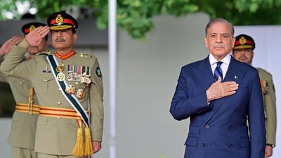 Pakistan's Prime Minister Shehbaz Sharif (R) and general Asim Munir review a passing out parade at the Pakistan Military Academy (PMA) Kakul, in Abbottabad. (AFP File) Pakistan's Prime Minister Shehbaz Sharif (R) and general Asim Munir review a passing out parade at the Pakistan Military Academy (PMA) Kakul, in Abbottabad. (AFP File)