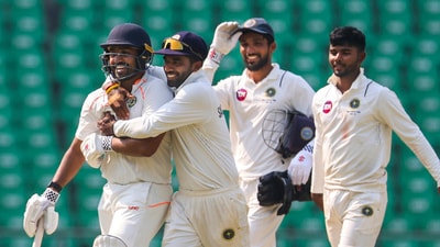 Vidarbha's batter Karun Nair is being congratulated (PTI) Vidarbha's batter Karun Nair is being congratulated (PTI)
