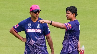 Rajasthan Royals' Vaibhav Suryavanshi, right, with head coach Rahul Dravid (PTI)