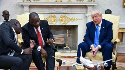 The meeting with Ramaphosa comes amid tensions over Washington's resettlement of white Afrikaners that the US president claims are the victims of "genocide." (Photo by Jim WATSON / AFP) (AFP) The meeting with Ramaphosa comes amid tensions over Washington's resettlement of white Afrikaners that the US president claims are the victims of "genocide." (Photo by Jim WATSON / AFP) (AFP)
