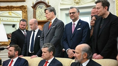 US Vice President JD Vance, US White House deputy chief of staff Stephen Miller (top-L), US Defense Secretary Pete Hegseth (bottom-2ndL), US Secretary of Commerce Howard Lutnick (bottom-R), and Elon Musk look (top-R) on as US President Donald Trump meets with South African President Cyril Ramaphosa in the Oval Office. (AFP) US Vice President JD Vance, US White House deputy chief of staff Stephen Miller (top-L), US Defense Secretary Pete Hegseth (bottom-2ndL), US Secretary of Commerce Howard Lutnick (bottom-R), and Elon Musk look (top-R) on as US President Donald Trump meets with South African President Cyril Ramaphosa in the Oval Office. (AFP)