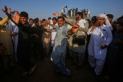 Members of a team dance as they celebrating after winning a traditional bull race competition, in Malal, a village of Attock district, in Pakistan, Thursday, May 15, 2025. (Anjum Naveed/AP) Members of a team dance as they celebrating after winning a traditional bull race competition, in Malal, a village of Attock district, in Pakistan, Thursday, May 15, 2025. (Anjum Naveed/AP)