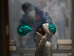 A health worker takes a nasal swab of a person for a Covid-19 test at a hospital in New Delhi. (AP file) A health worker takes a nasal swab of a person for a Covid-19 test at a hospital in New Delhi. (AP file)