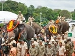 Kumki elephants are handed over to AP govt by Karnataka. Kumki elephants are handed over to AP govt by Karnataka.