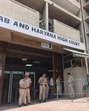Police conducting a search after the bomb threat at the Punjab and Haryana high court complex in Chandigarh on Thursday. (Ravi Kumar/HT) Police conducting a search after the bomb threat at the Punjab and Haryana high court complex in Chandigarh on Thursday. (Ravi Kumar/HT)