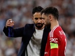 Manchester United manager Ruben Amorim with Manchester United's Bruno Fernandes after the match.