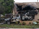 A home is partially destroyed where a small plane crashed into a San Diego, California, residential street on May 22, 2025. The Federal Aviation Authority said a Cessna 550 crashed at around 3:45 am local time. The neighborhood is close to the Montgomery-Gibbs Executive Airport. The crash left a "gigantic debris field" and damaged some 15 homes and parked cars, ABC News quoted the San Diego assistant fire chief as saying. (Photo by Sandy Huffaker / AFP)