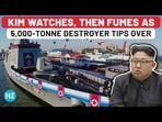 KIM WATCHES, THEN FUMES AS 5,000-TONNE DESTROYER TIPS OVER KIM WATCHES, THEN FUMES AS 5,000-TONNE DESTROYER TIPS OVER