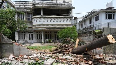 A mango tree uprooted by the storm in Nazamuddin East in New Delhi on Thursday. (Sonu Mehta/HT Photo) A mango tree uprooted by the storm in Nazamuddin East in New Delhi on Thursday. (Sonu Mehta/HT Photo)