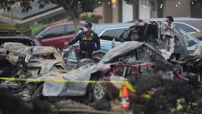 Authorities work the scene where a small plane crashed into a San Diego neighborhood, setting several homes on fire and forcing evacuations along several blocks early Thursday, May 22, 2025. (AP Photo/Gregory Bull) (AP) Authorities work the scene where a small plane crashed into a San Diego neighborhood, setting several homes on fire and forcing evacuations along several blocks early Thursday, May 22, 2025. (AP Photo/Gregory Bull) (AP)