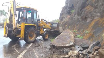 According to National Highways Authority of India (NHAI) workers on site, the landslide took place around midnight due to the heavy downpour that lashed the region. Cleanup operations began early in the morning, with teams working continuously to clear the debris and restore normal traffic flow. (HT PHOTO) According to National Highways Authority of India (NHAI) workers on site, the landslide took place around midnight due to the heavy downpour that lashed the region. Cleanup operations began early in the morning, with teams working continuously to clear the debris and restore normal traffic flow. (HT PHOTO)
