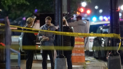 Law enforcement work the scene after two staff members of the Israeli Embassy in Washington were shot and killed outside the Capital Jewish Museum. (AP Photo/Rod Lamkey, Jr.) (AP)