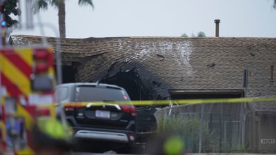 A home is damaged after a small plane crashed into a San Diego neighborhood, early Thursday, May 22, 2025. (AP Photo/Gregory Bull) (AP) A home is damaged after a small plane crashed into a San Diego neighborhood, early Thursday, May 22, 2025. (AP Photo/Gregory Bull) (AP)