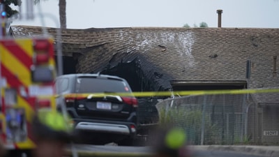 A home was damaged after a small plane crashed into a San Diego neighbourhood early Thursday, May 22, 2025. (AP) A home was damaged after a small plane crashed into a San Diego neighbourhood early Thursday, May 22, 2025. (AP)