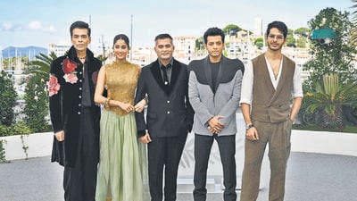 TOPSHOT - (From L) Indian producer Karan Johar, Indian actress Janhvi Kapoor, Indian director and writer Neeraj Ghaywan, Indian actor Vishal Jethwa and Indian actor Ishaan Khatter pose during a photocall for the film "Homebound" at the 78th edition of the Cannes Film Festival in Cannes, southern France, on May 21, 2025. (Photo by Bertrand GUAY / AFP) (AFP) TOPSHOT - (From L) Indian producer Karan Johar, Indian actress Janhvi Kapoor, Indian director and writer Neeraj Ghaywan, Indian actor Vishal Jethwa and Indian actor Ishaan Khatter pose during a photocall for the film "Homebound" at the 78th edition of the Cannes Film Festival in Cannes, southern France, on May 21, 2025. (Photo by Bertrand GUAY / AFP) (AFP)