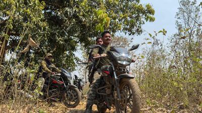 This photograph shows former Maoist commander and District Reserve Guard commando patrolling on a motorcycle during a simulation exercise at their base in Dantewada, in Bastar division on March 16 (AFP FILE) This photograph shows former Maoist commander and District Reserve Guard commando patrolling on a motorcycle during a simulation exercise at their base in Dantewada, in Bastar division on March 16 (AFP FILE)