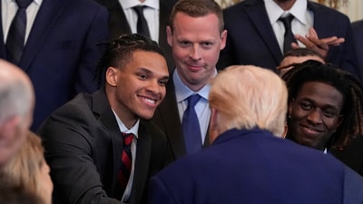 President Donald Trump shakes hands with Will Richard as he hosts the 2025 NCAA Champion, University of Florida men's basketball team in the East Room of the White House, Wednesday, May 21, 2025, in Washington. (AP Photo/Julia Demaree Nikhinson) (AP)