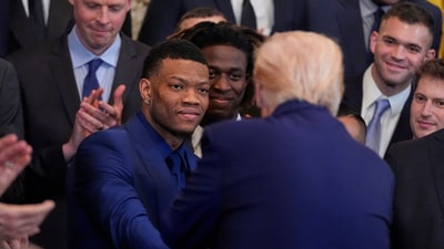 President Donald Trump greets Alijah Martin as he hosts the 2025 NCAA Champion, University of Florida men's basketball team in the East Room of the White House, Wednesday, May 21, 2025, in Washington. (AP Photo/Julia Demaree Nikhinson) (AP)