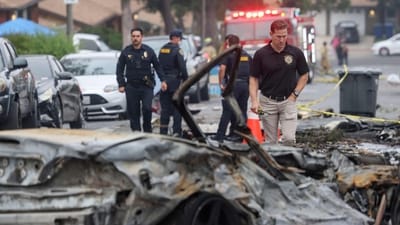 Investigators look through the site where a small plane crashed into San Diego, California, residential street on May 22, 2025. The Federal Aviation Authority said a Cessna 550 crashed at around 3:45 am local time. The neighborhood is close to the Montgomery-Gibbs Executive Airport. The crash left a "gigantic debris field" and damaged some 15 homes and parked cars, ABC News quoted the San Diego assistant fire chief as saying. (Photo by Sandy Huffaker / AFP) (AFP) Investigators look through the site where a small plane crashed into San Diego, California, residential street on May 22, 2025. The Federal Aviation Authority said a Cessna 550 crashed at around 3:45 am local time. The neighborhood is close to the Montgomery-Gibbs Executive Airport. The crash left a "gigantic debris field" and damaged some 15 homes and parked cars, ABC News quoted the San Diego assistant fire chief as saying. (Photo by Sandy Huffaker / AFP) (AFP)