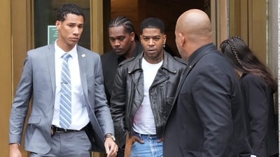 Rapper Kid Cudi (C) leaves the federal court after appearing at the Sean "Diddy" Combs sex trafficking trial in New York City on May 22, 2025. Prosecutors trying the case of Sean "Diddy" Combs on Monday began questioning witnesses to his alleged pattern of violence including the music mogul's ex-girlfriend's one-time best friend. (Photo by TIMOTHY A. CLARY / AFP) (AFP)