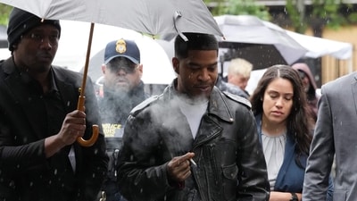 Rapper Kid Cudi (C) arrives at federal court for the Sean "Diddy" Combs sex trafficking trial in New York City on May 22, 2025. Prosecutors trying the case of Sean "Diddy" Combs on Monday began questioning witnesses to his alleged pattern of violence including the music mogul's ex-girlfriend's one-time best friend. (Photo by TIMOTHY A. CLARY / AFP) (AFP)
