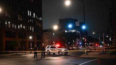 FBI agents cordon off the scene outside the Capital Jewish Museum following a shooting that left two people dead, in Washington, DC, on May 21, 2025. (AFP) FBI agents cordon off the scene outside the Capital Jewish Museum following a shooting that left two people dead, in Washington, DC, on May 21, 2025. (AFP)