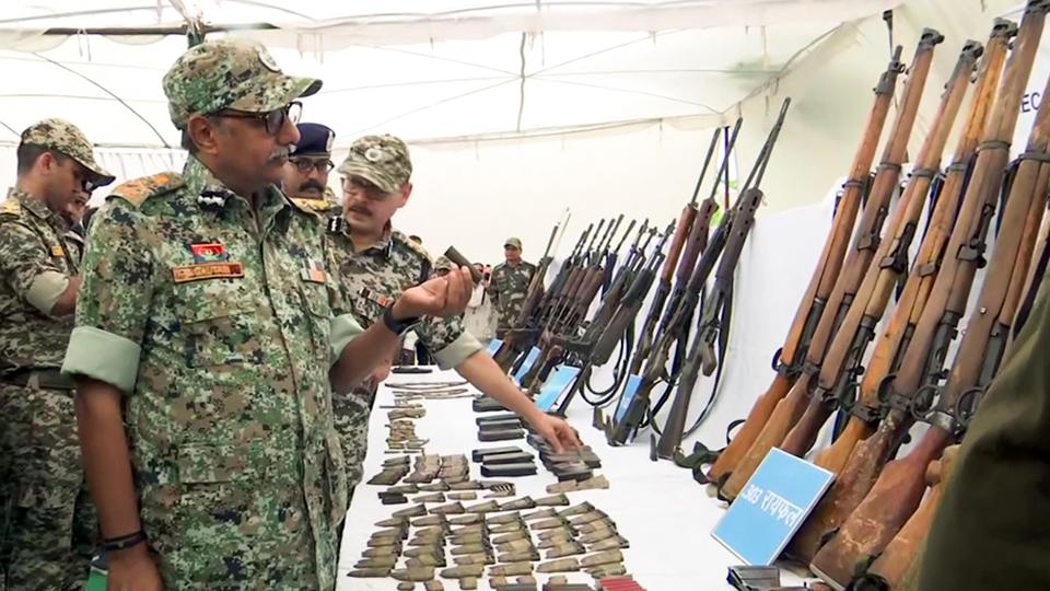 Top Chhattisgarh police officers inspect the weapons seized after the encounter between DRG jawans and Naxals in Abujhmad in Narayanpur on May 21 (ANI) Top Chhattisgarh police officers inspect the weapons seized after the encounter between DRG jawans and Naxals in Abujhmad in Narayanpur on May 21 (ANI)